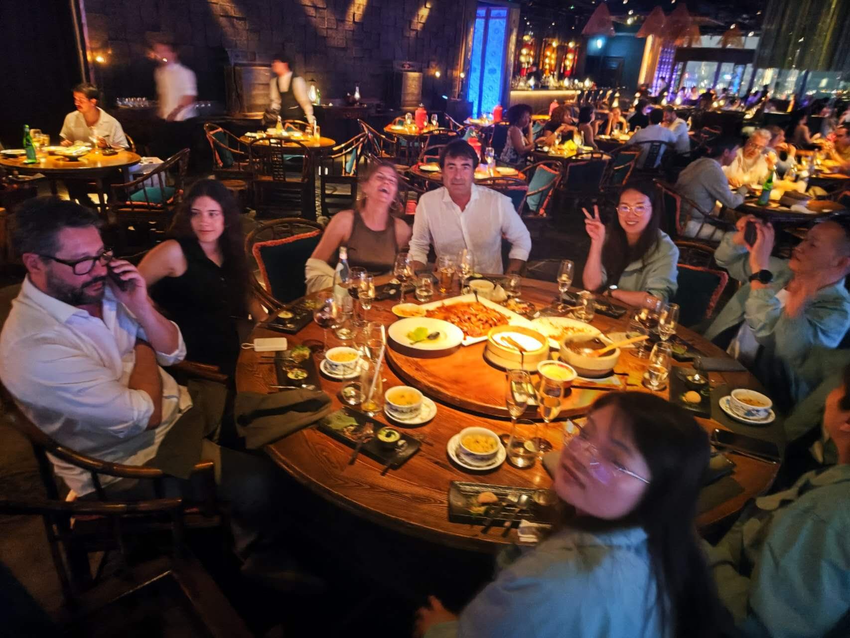 NaikeCraft team sharing a dinner with international customers