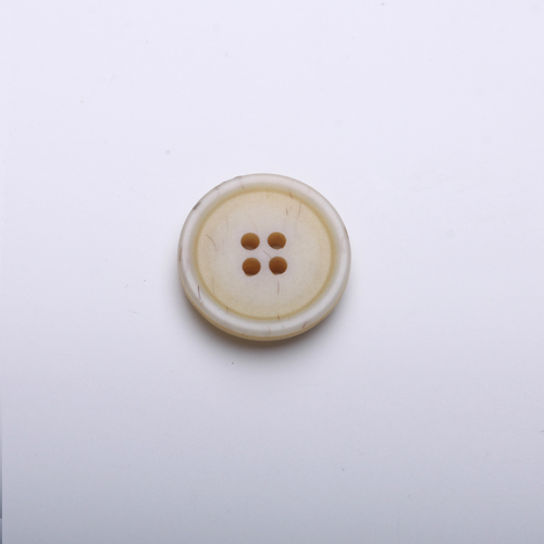 > imitation bone button