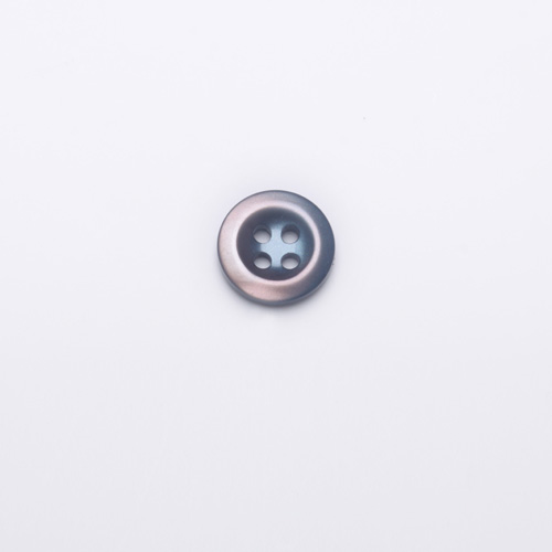 > imitation shell button