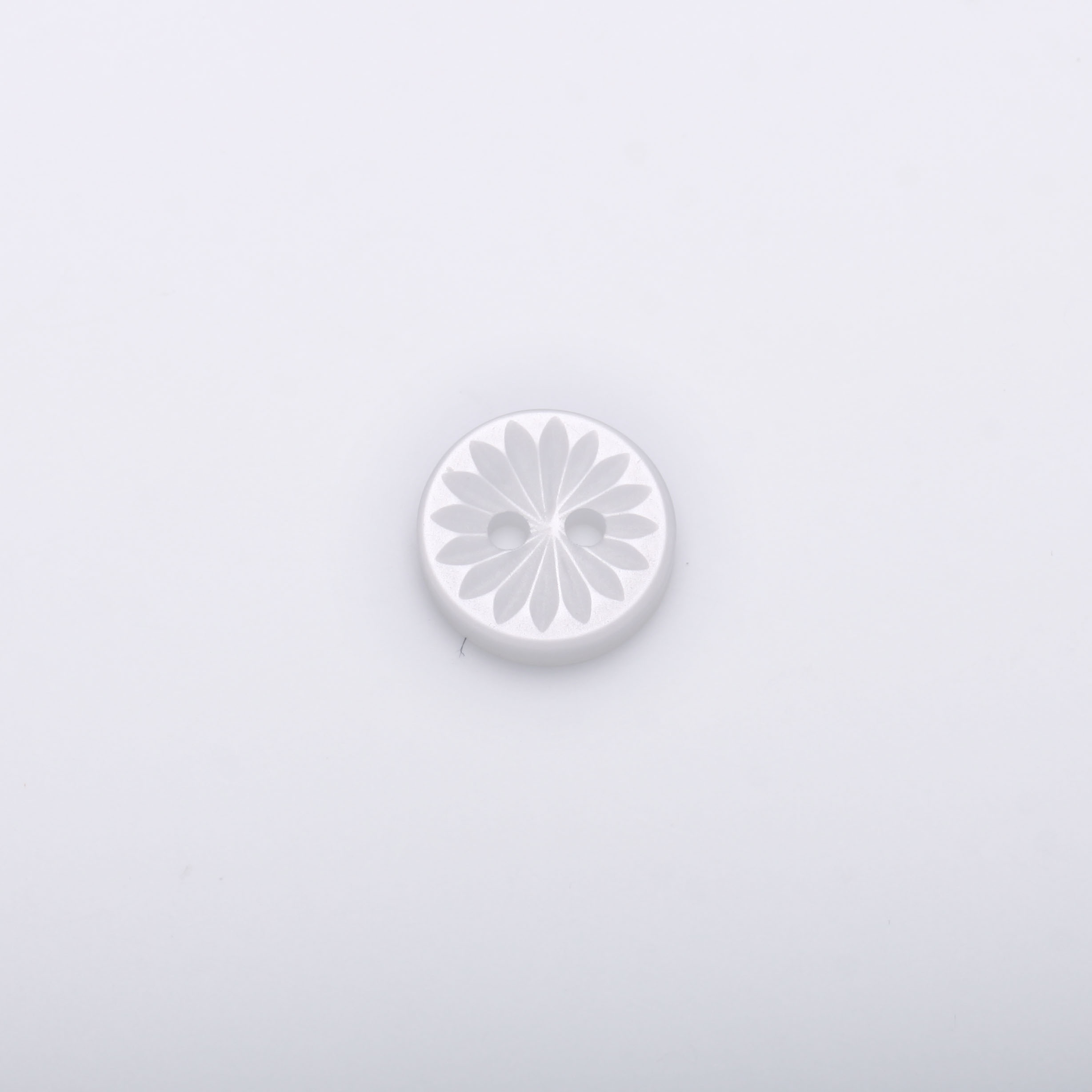 > irregular shape button